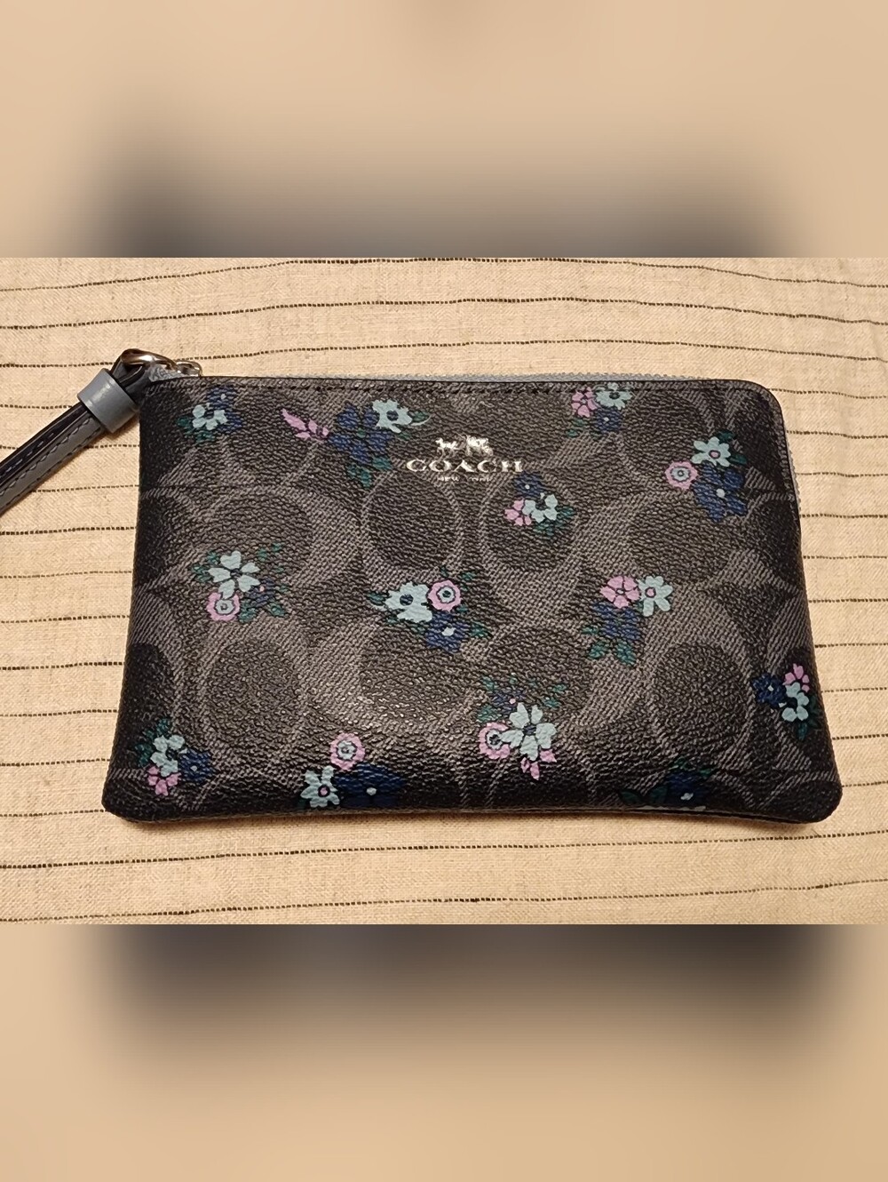 COACH Signature Floral Wristlet in Black